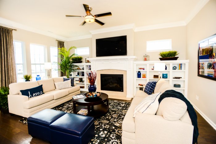 HDTV above fireplace in contemporary living room
